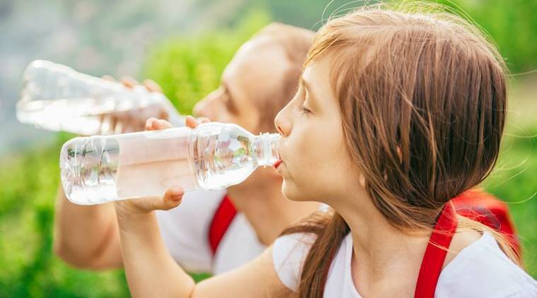 drinks lots of water To Lose Face Fat